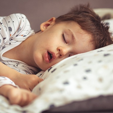 Boy sleeping with his mouth open